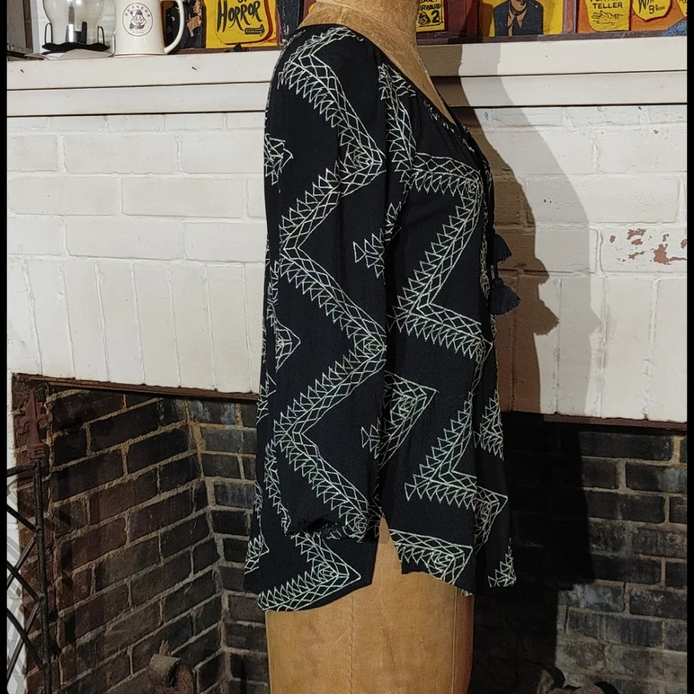 Lovestitch top- love tassels? I do
